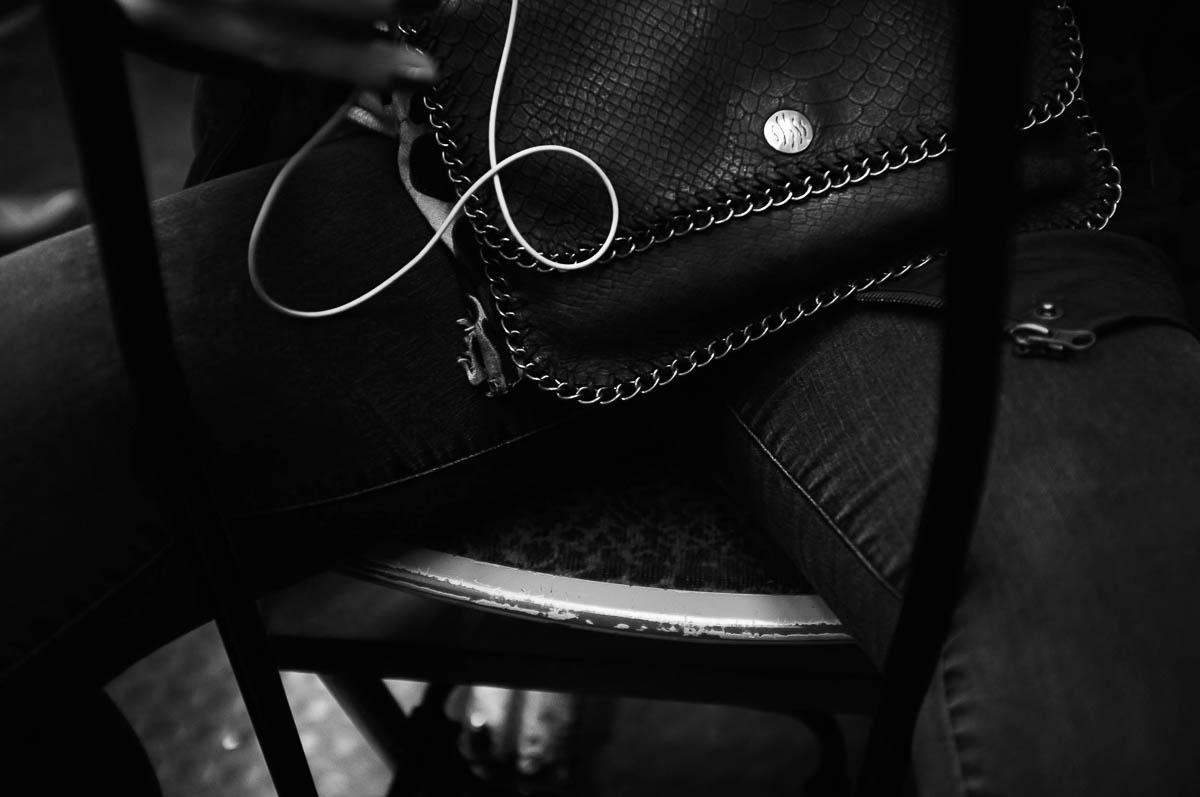 Close-up of the legs of a woman sitting opposite me on the Paris metro, from the series Going Underground by Emmanuel Pineau