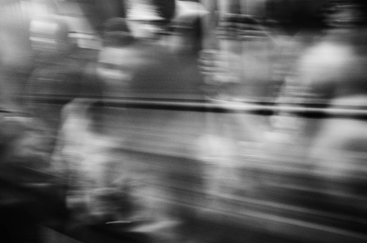 The blurred faces of people crammed into a subway car in Paris, from the series Going Underground by Emmanuel Pineau