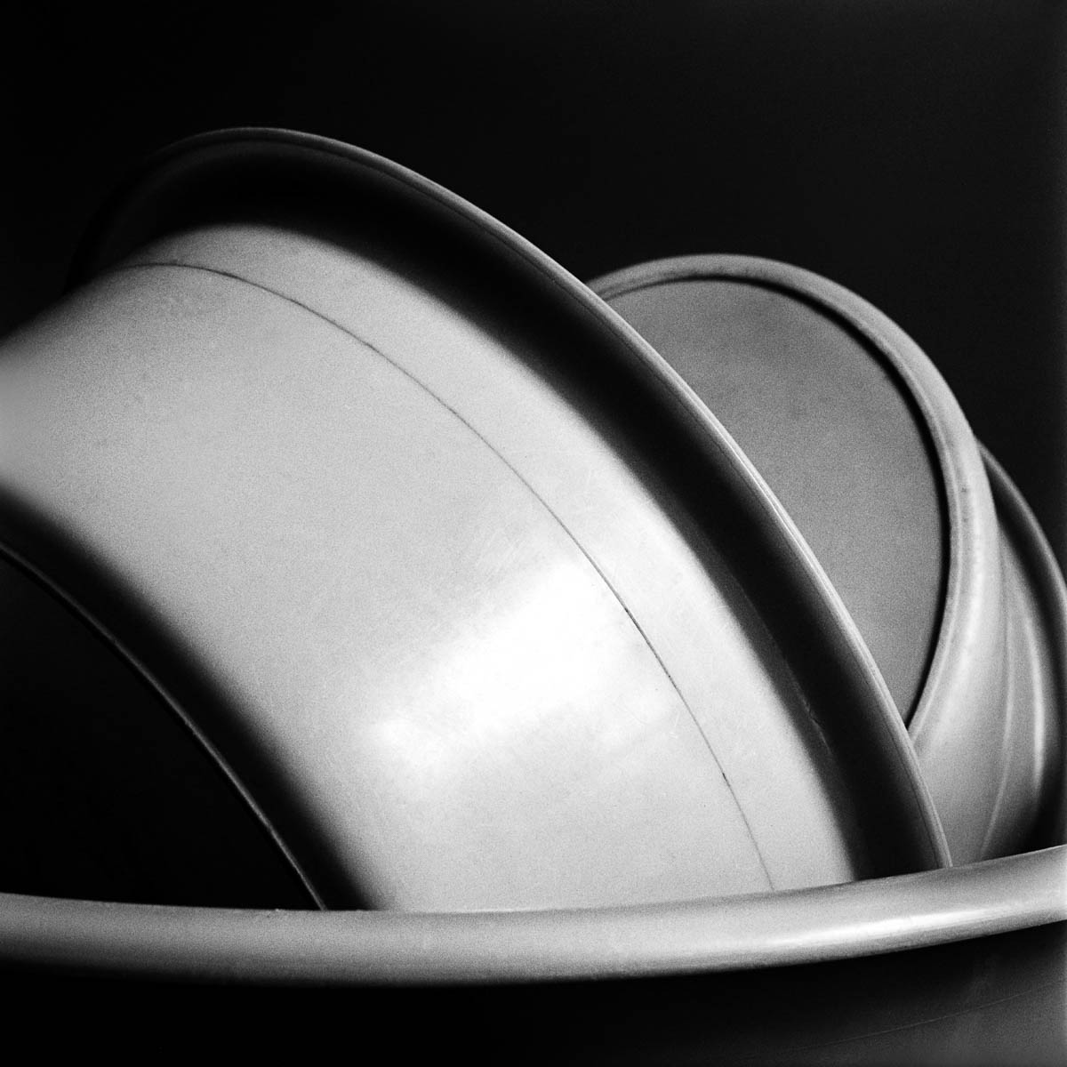Abstract composition with three plastic basins, from the series One piece of my mind by Emmanuel Pineau