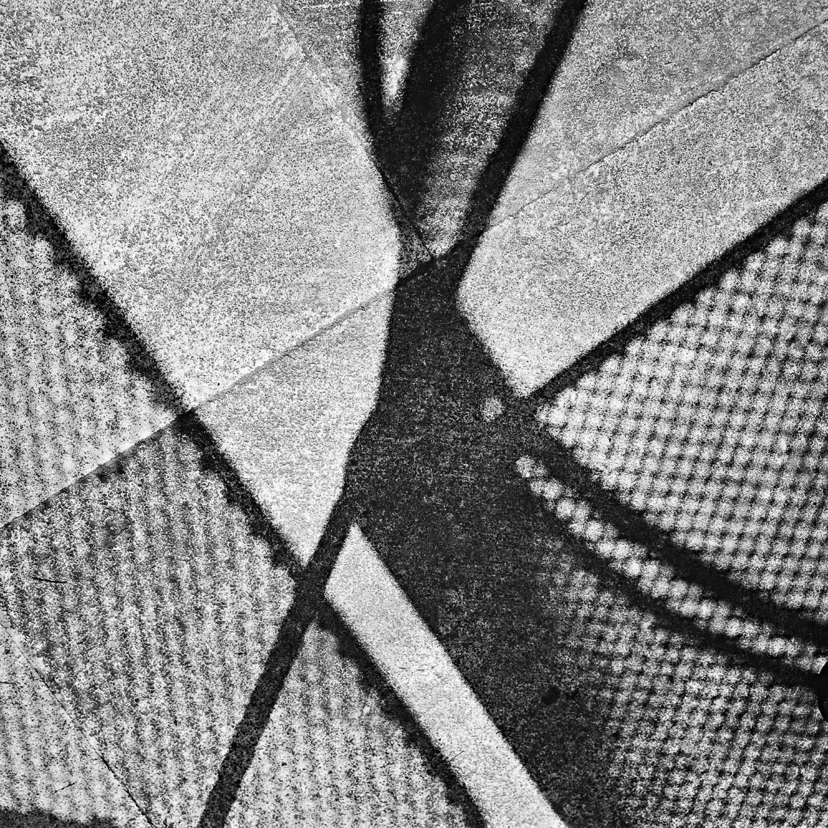 The shadows of the garden chairs on the terrace, from the series One piece of my mind by Emmanuel Pineau