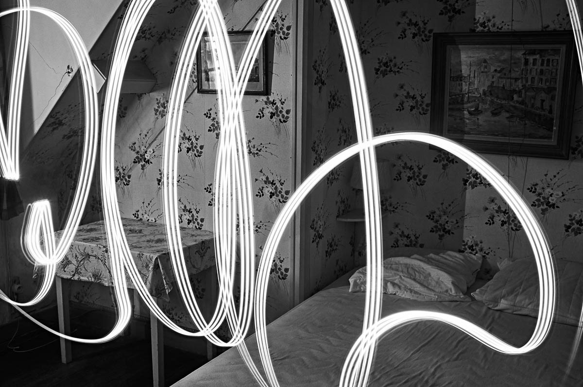 Abstract light painting effect in a vintage bedroom, from the series Out of disorders by Emmanuel Pineau