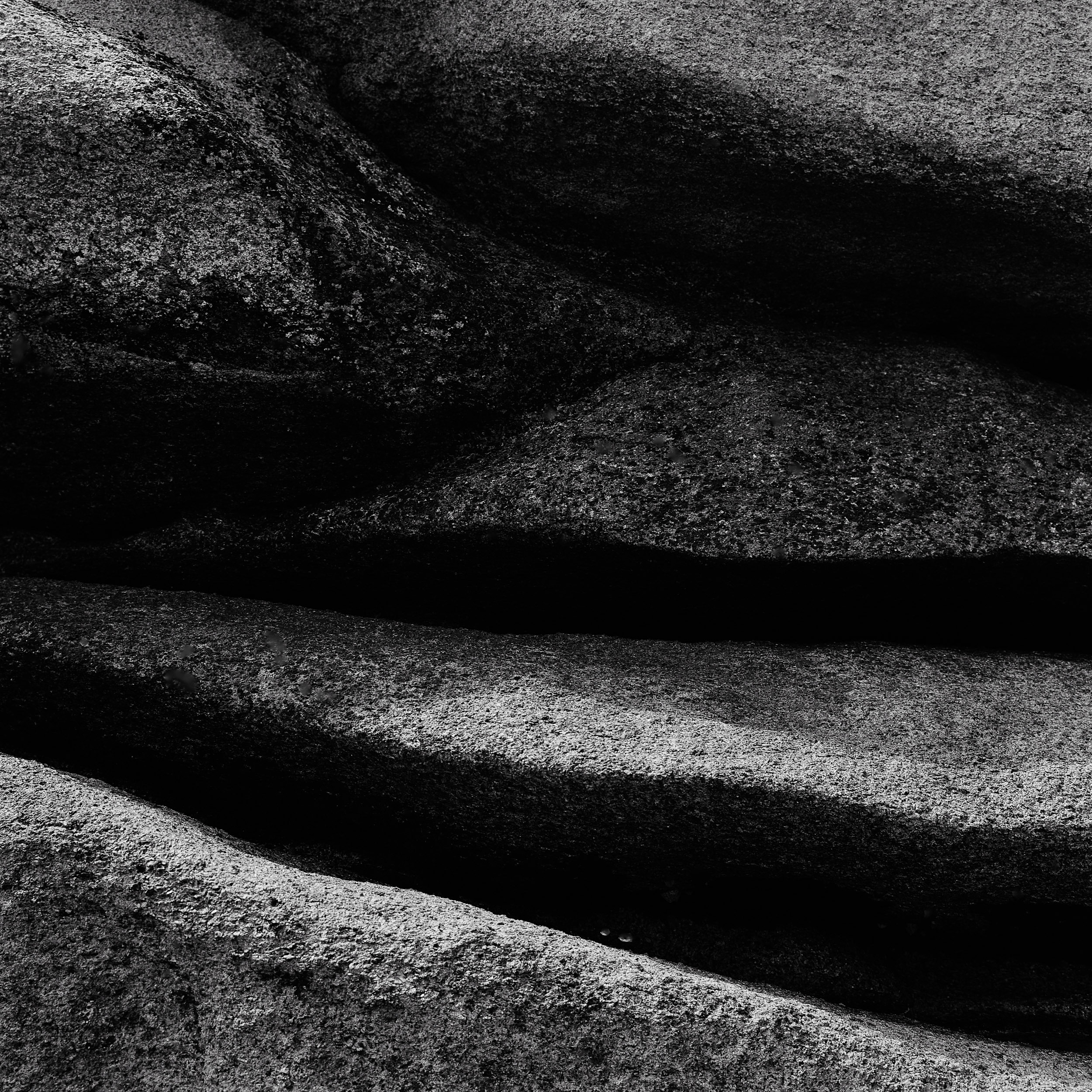 black and white analog photography of rocks in nothern Brittany, from the series solid as a rock by Emmanuel Pineau