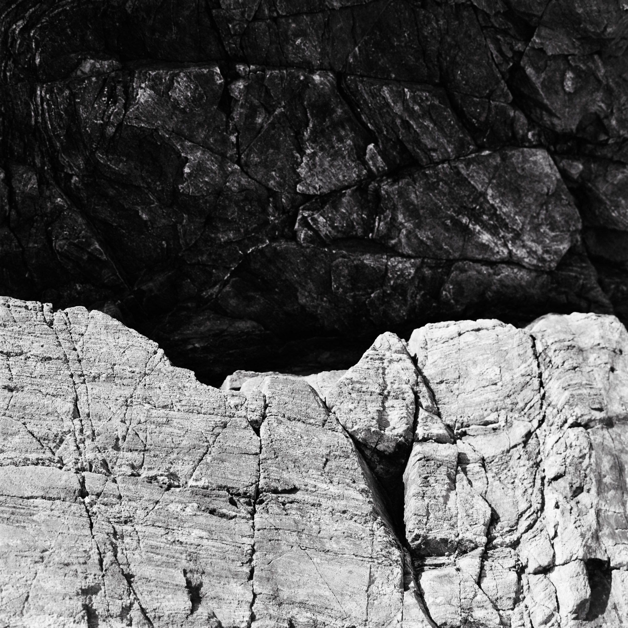 black and white analog photography of rocks in nothern Brittany, from the series solid as a rock by Emmanuel Pineau
