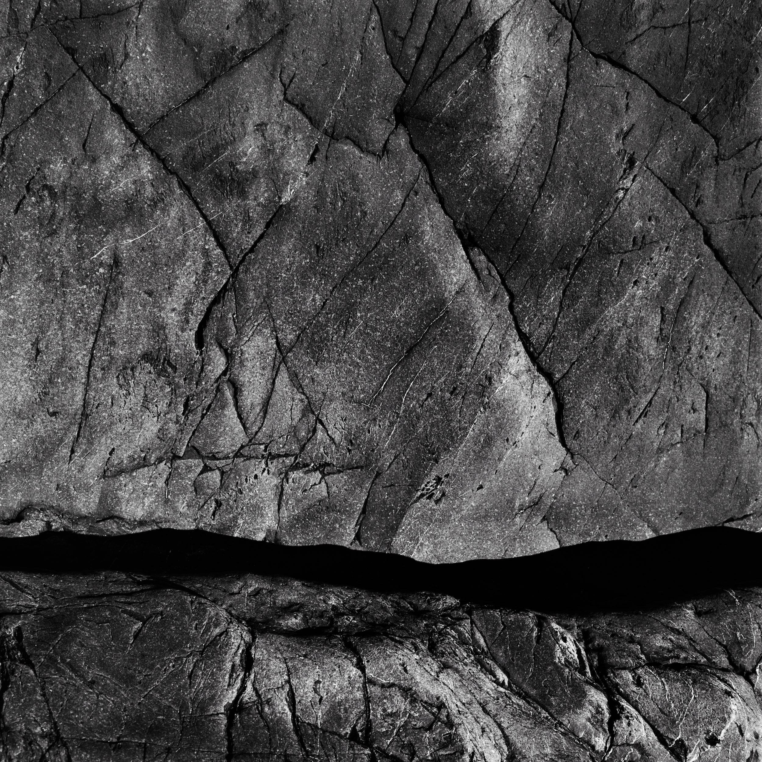 black and white analog photography of rocks in nothern Brittany, from the series solid as a rock by Emmanuel Pineau