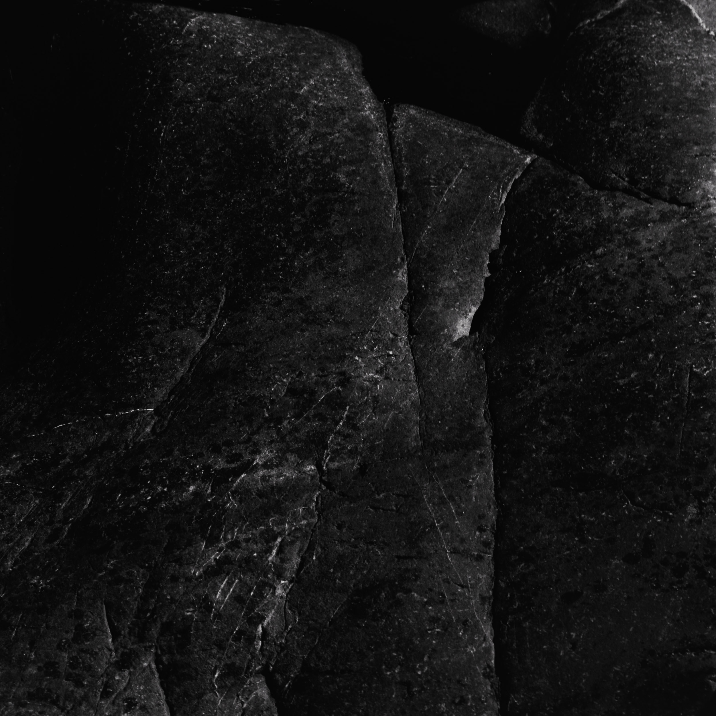black and white analog photography of rocks in nothern Brittany, from the series solid as a rock by Emmanuel Pineau